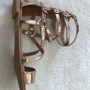 10 Women’s gladiator sandals rose gold.
